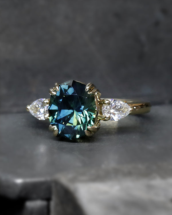 Australian sapphire trilogy with diamonds side stones.