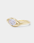 Sculpture curvy gold signet ring with a oval diamond