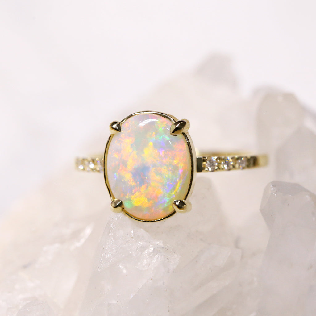 Opal solitaire Ring - 1.57ct oval rainbow white opal