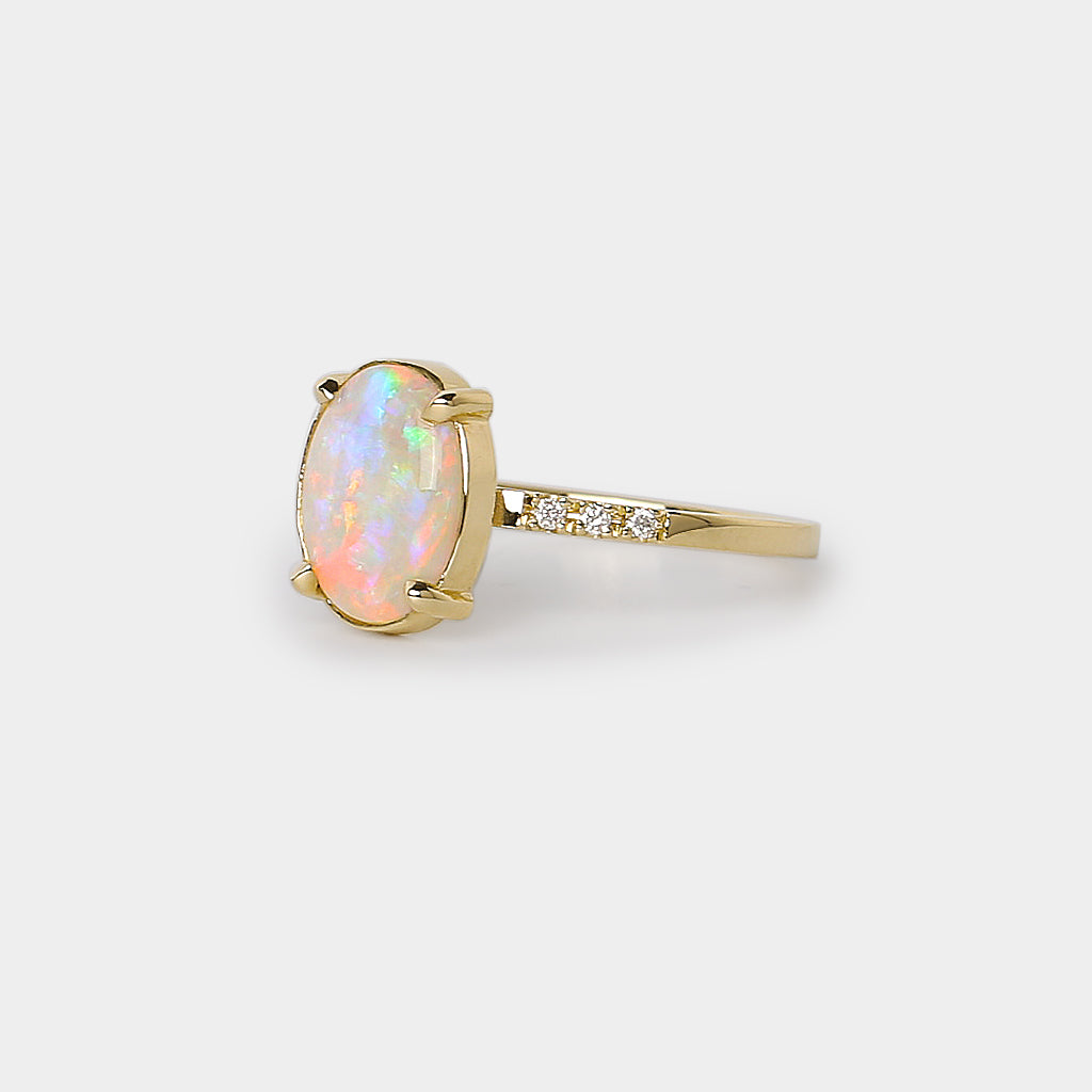 Opal solitaire Ring - 1.57ct oval rainbow white opal