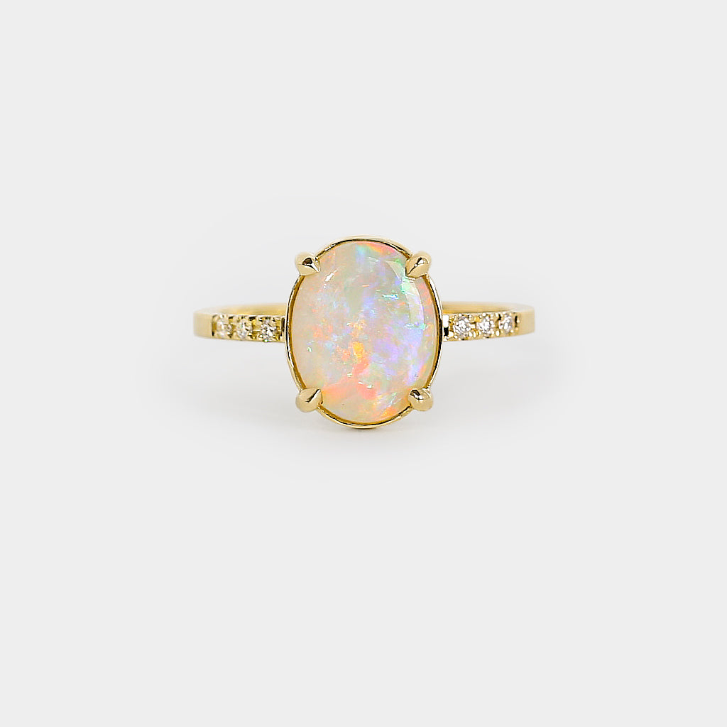 Opal solitaire Ring - 1.57ct oval rainbow white opal