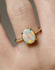 Opal solitaire Ring - 1.57ct oval rainbow white opal