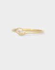 Gold ring with a small diamond and a pear Australian opal