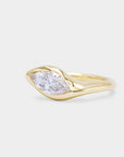 Sculpture curvy gold signet ring with a oval diamond