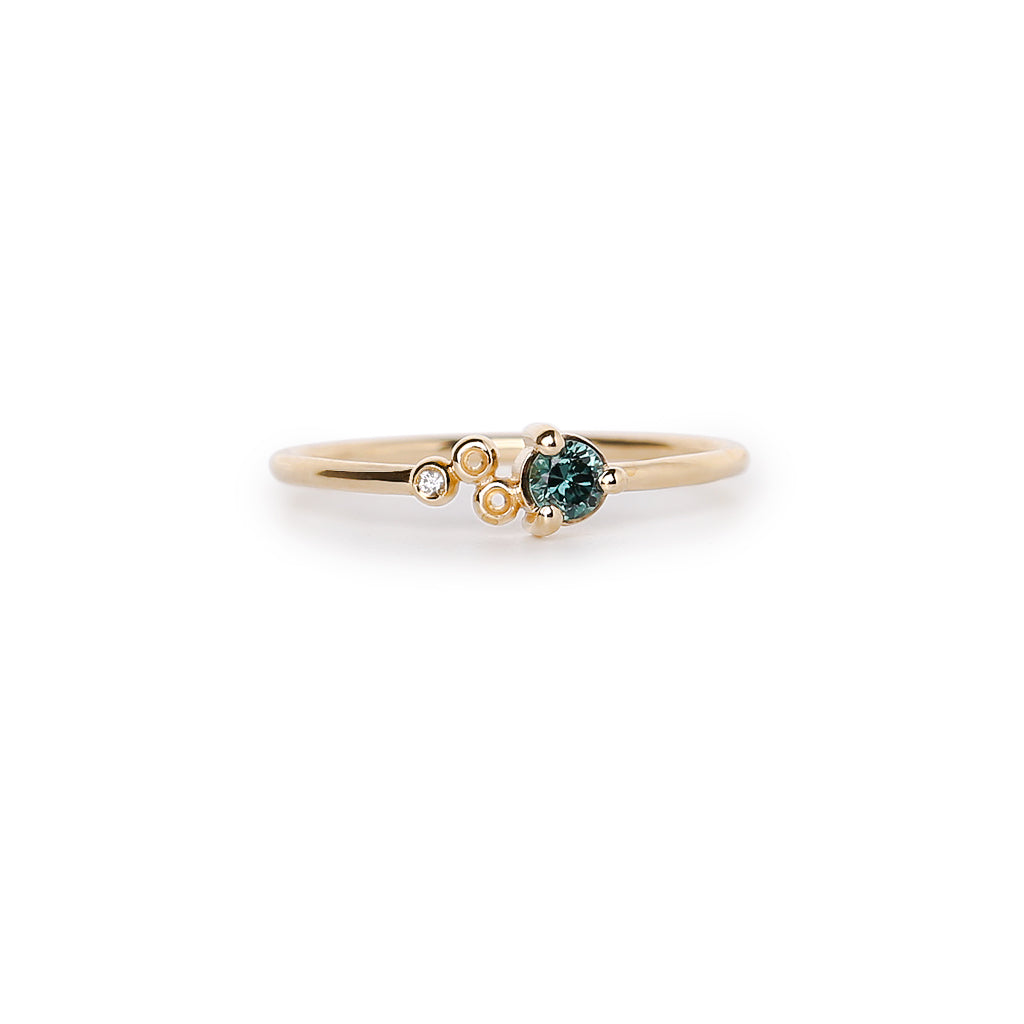 petite meteor crater teal sapphire ring