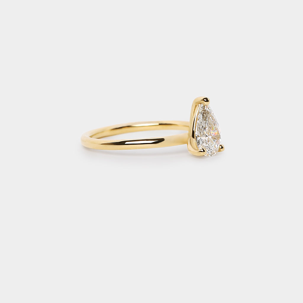Ritual solitaire plain band ring - 1.01ct pear lab white diamond